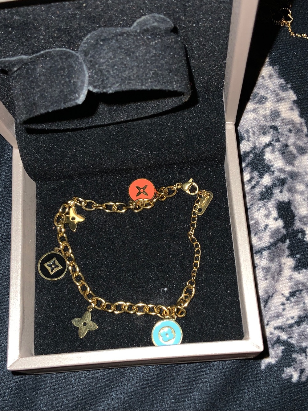 Gold Charm Bracelet with Orange and Light Blue Enamel Discs